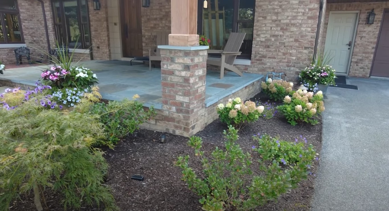 Hardscaping and paver patio installation with outdoor furniture and professional landscaping in Lake Forest